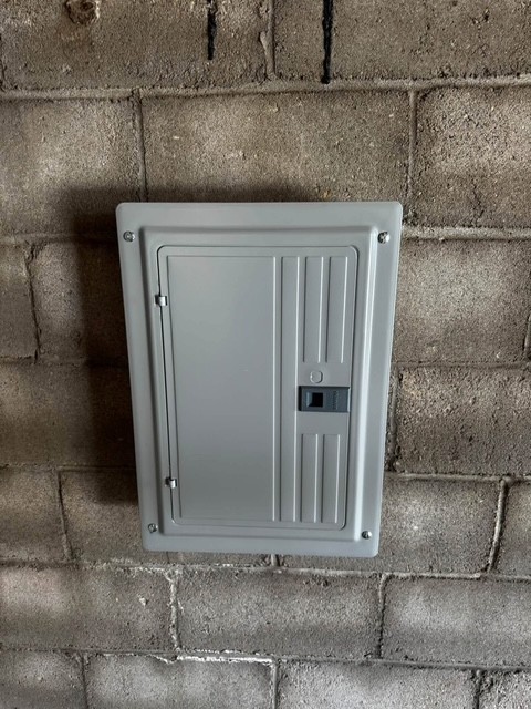 Electrical panel mounted on masonry